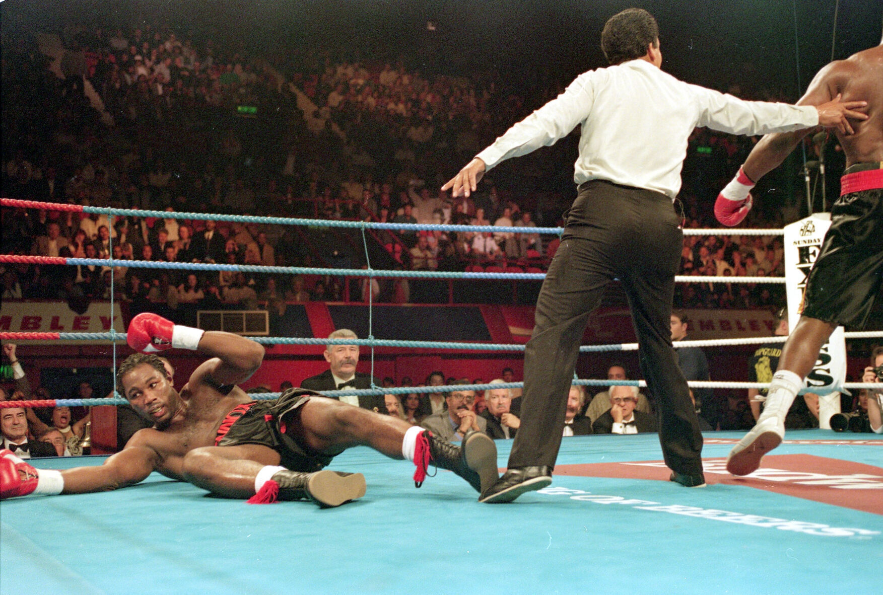 1994: Oliver McCall stuns Lennox Lewis to capture WBC heavyweight title